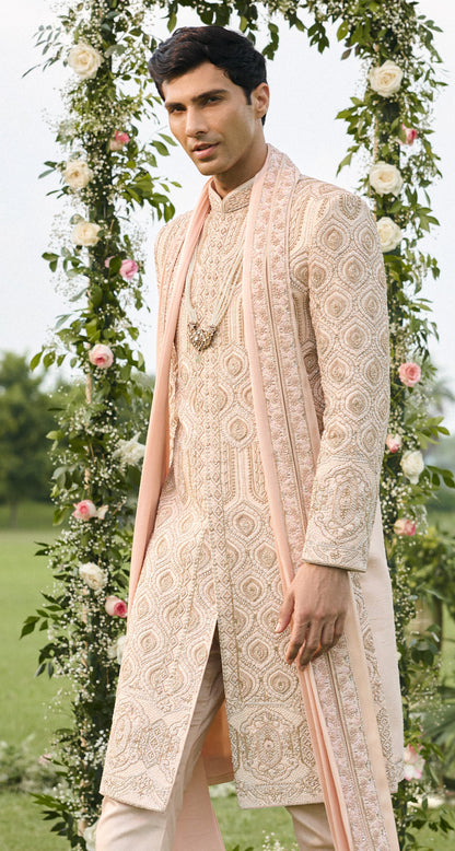Peachish Pink Raw Silk Sherwani Set With Rose Gold Zardosi Work