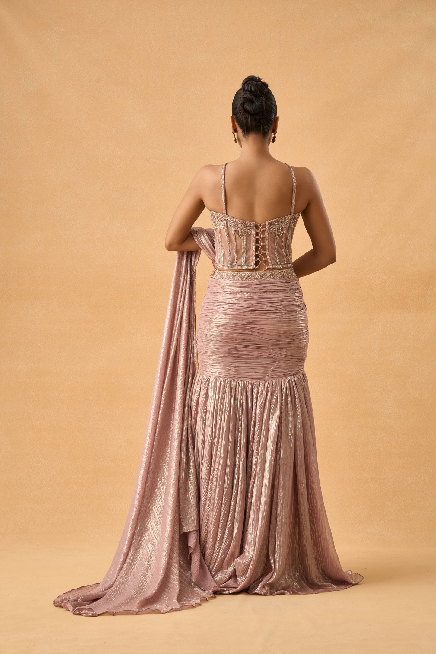 Metallic Dark Peach Fish-Cut Drape Saree With Corset Blouse