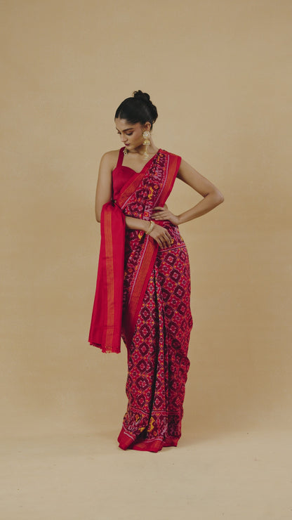 Crimson Red Patola Silk Weave Saree With Golden Zari Piping